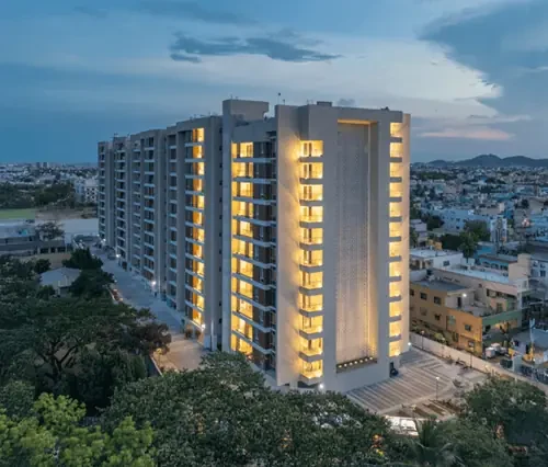 Completed Puravankara residential tower at dusk