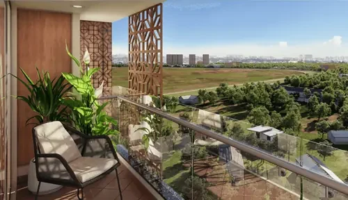 Apartment balcony with chair, looking over open ground